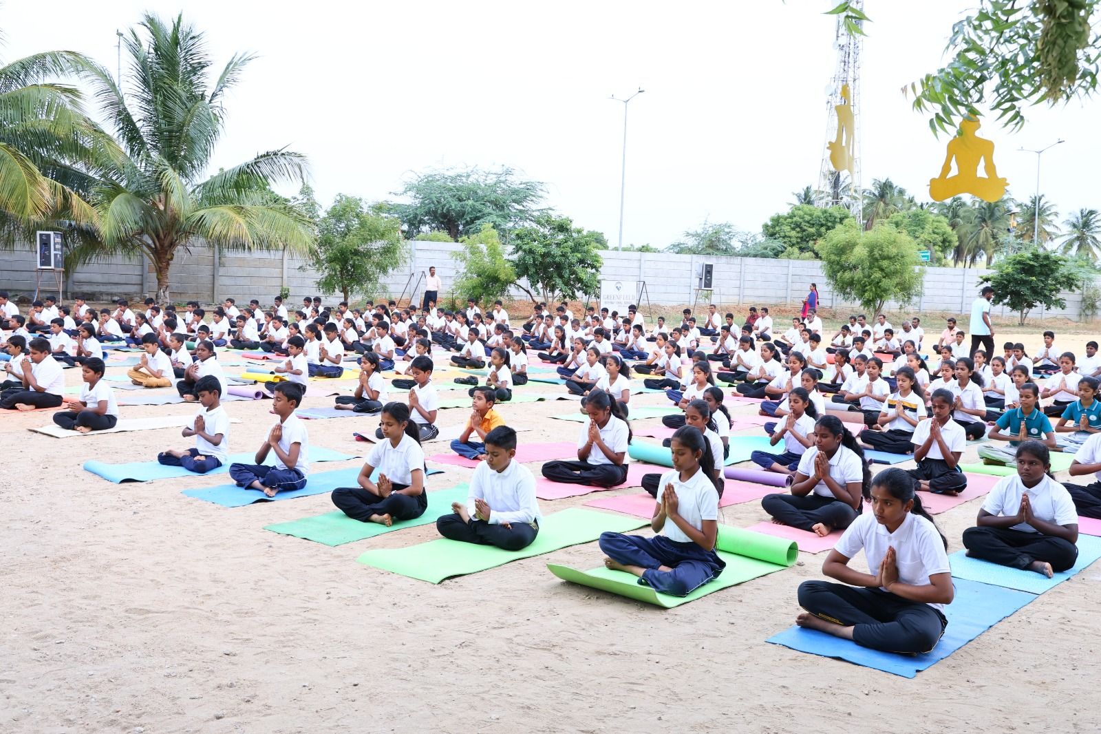 International Yoga Day at GFIS — students practising yoga together
